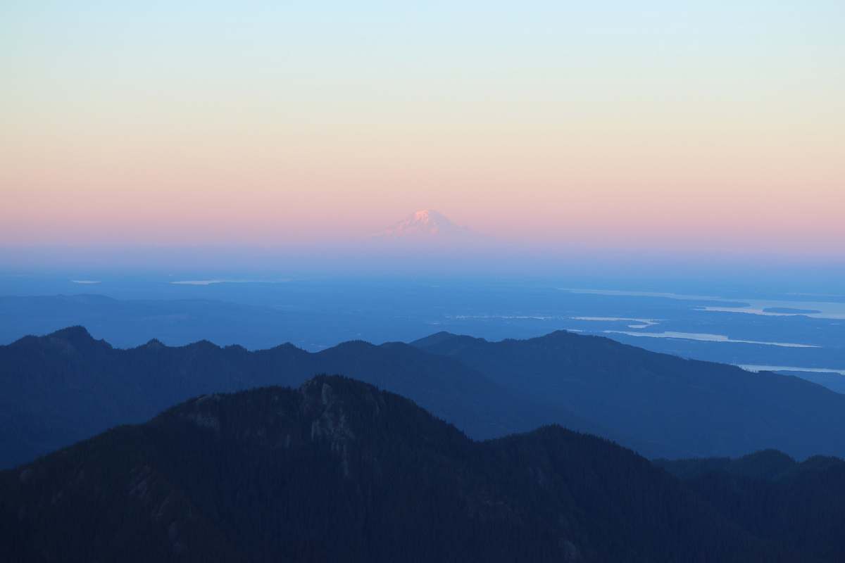 mountain range landscape photography of silhouette of mountains during daytime sunrise
